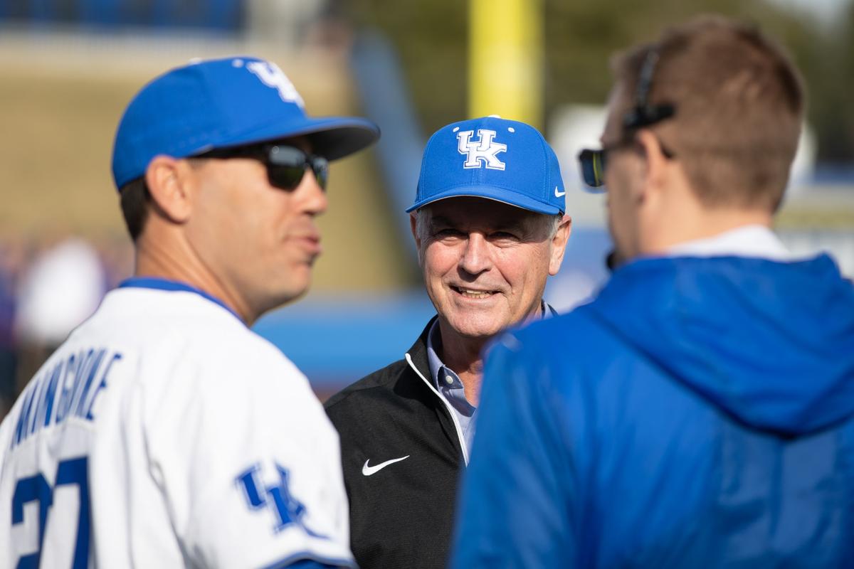 Former Kentucky coach Keith Madison, center, threw out one of the ceremonial first pitches ahead of the inaugural baseball game at Kentucky Proud Park on Tuesday.