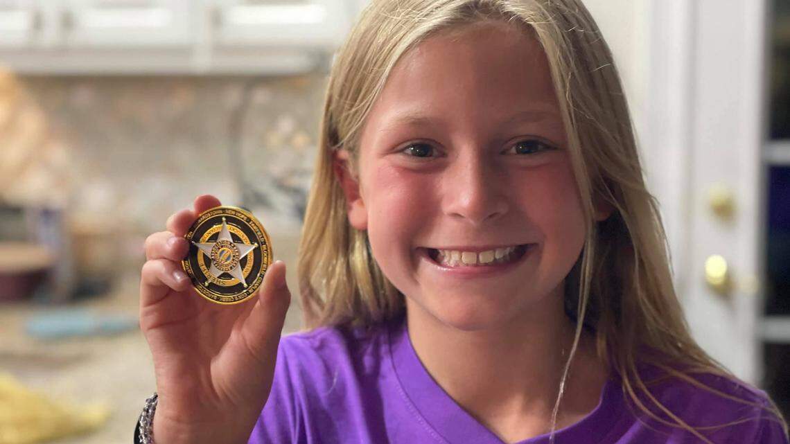 10-year-old Laken Blanford received a special coin from the Nelson County Sheriff’s Office after her quick thinking when an intruder broke in her family’s home.