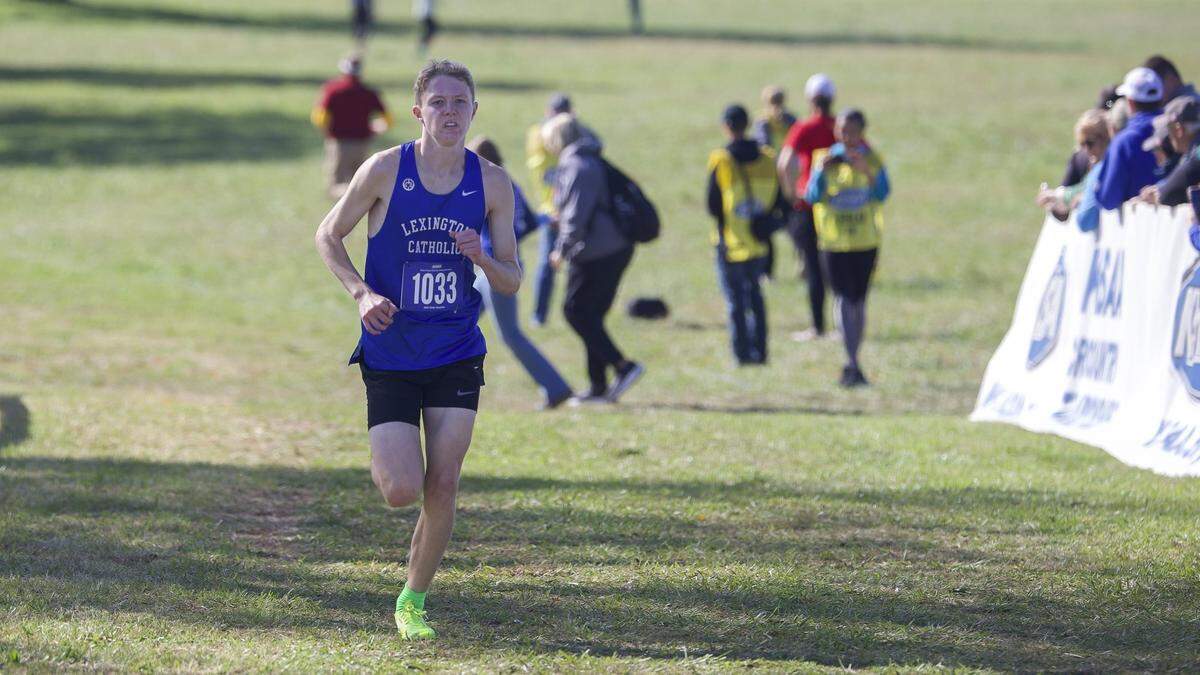 Lexington Cathlic's Mark Reinhart competes during the 2025 KHSAA Class 2A State Cross Country Meet at the Kentucky Horse Park in Lexington, Ky., on Saturday, Nov. 1, 2025. Reinhart won fourth place and was the top finisher for Lexington Catholic, which won the team title. 