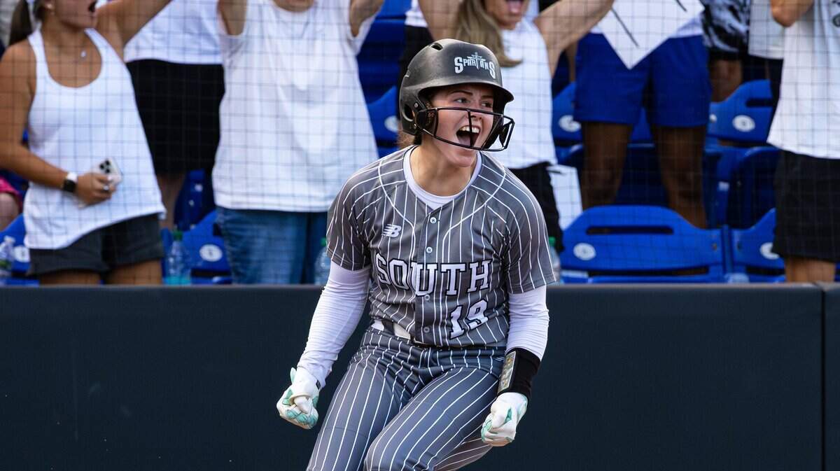 South Warren's McLaine Hudson crossing home plate during the State Softball Tournament Championship game between the South Warren Spartans and the Bullitt East Chargers at John Cropp Stadium on June 13, 2026, in Lexington, Ky.