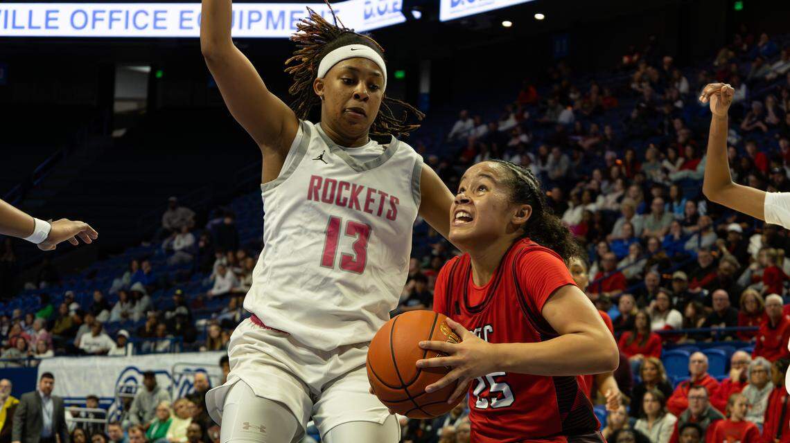 Assumption's Ashlinn James attempts to block GRC's Anaya Chestnut's two-point attempt during the 2026 Clark's Pump-N-Shop Girls' Basketball Sweet 16 state tournament game between Assumption and George Rogers Clark at Rupp Arena on March 14, 2026, in Lexington, Ky.