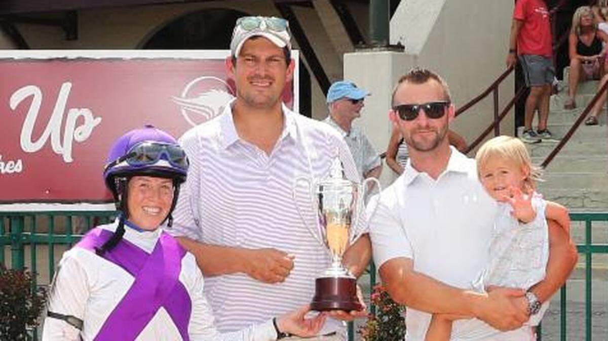 Left to right, jockey Sophie Doyle and trainer Justin Wojczynski along with Doyle’s fiance, Chris Davis, and their daughter, Emilie.