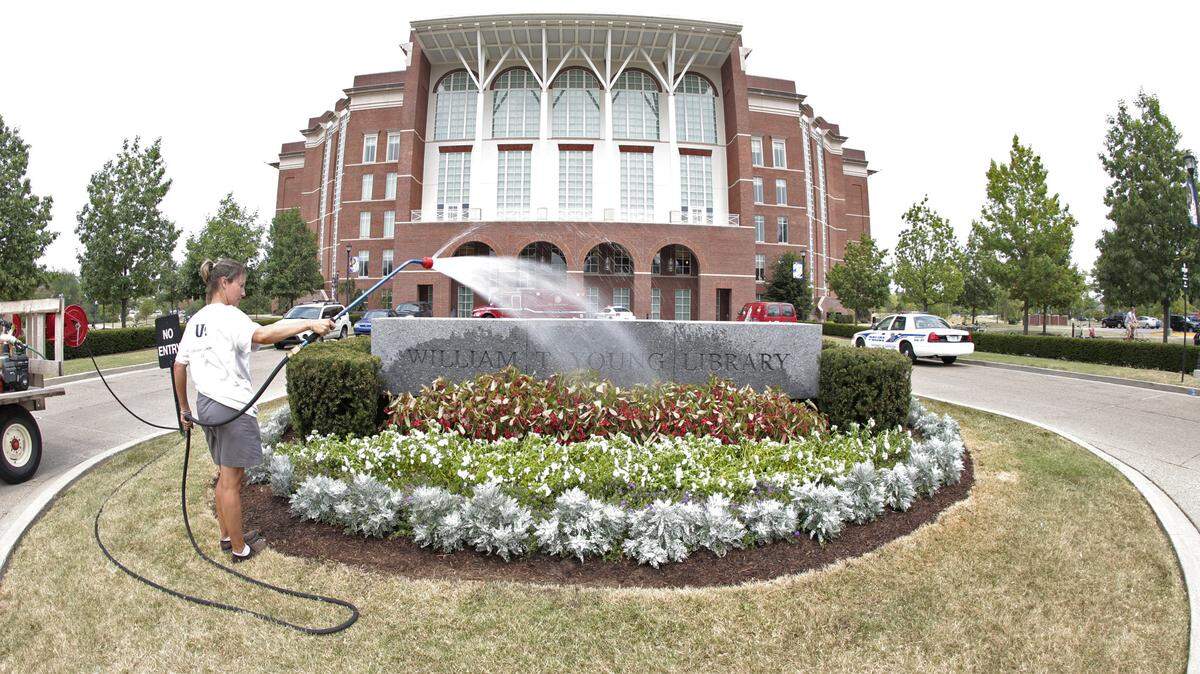 About 14,000 people work for the University of Kentucky — including its William T. Young Library shown here — making it Central Kentucky’s top employer.