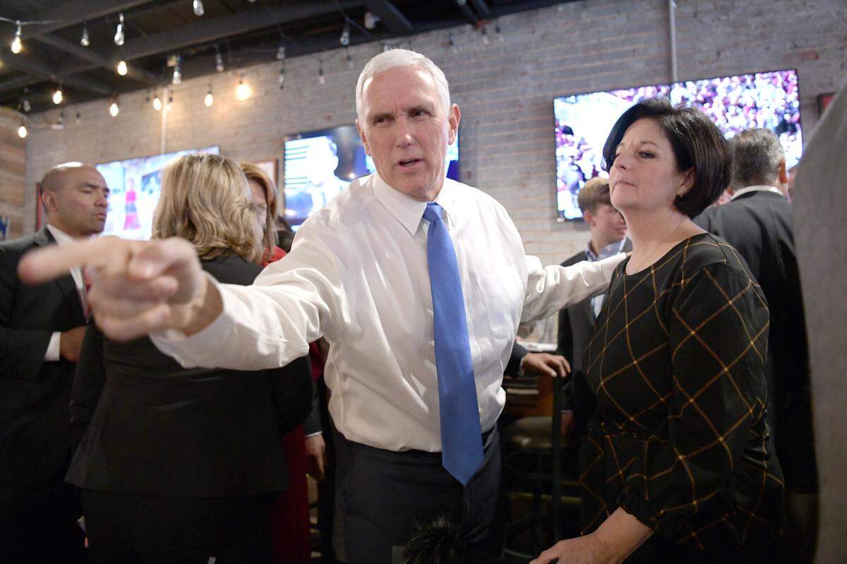 Vice President Mike Pence greets patrons at Shep’s Place Restaurant and Bar Friday, Nov. 1, 2019, while campaigning for Kentucky Gov. Matt Bevin in Corbin, Ky.