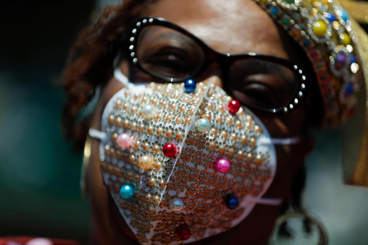 Sandra Hereford’s co-worker made her mask and she added the “bling” to match her hat that she purchased on Etsy.