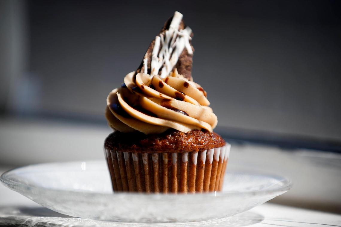 The mudslide cupcake, a chocolate cupcake with mocha frosting and Baileys topped with coffee bark at Cupcake Apothecary in Winchester.