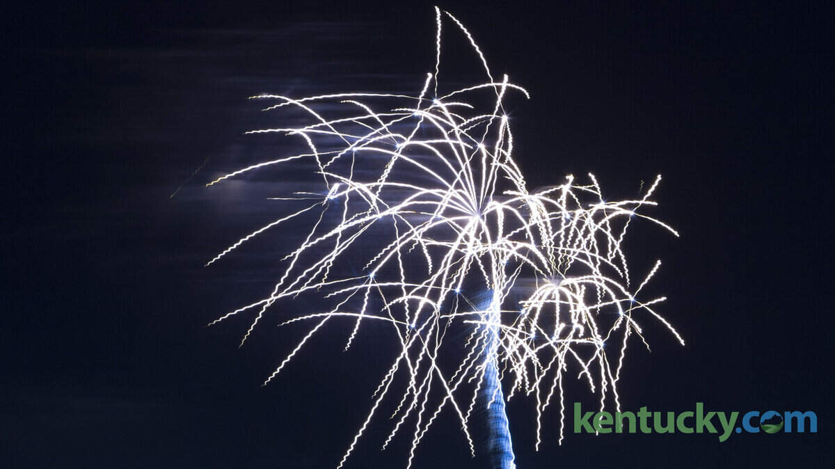 A crowd gathered on the top floor of a parking structure on Broadway near High street to watch the downtown fireworks presented by Thorntons on July  4, 2014 in Lexington, Ky.  Photo by Mark Mahan