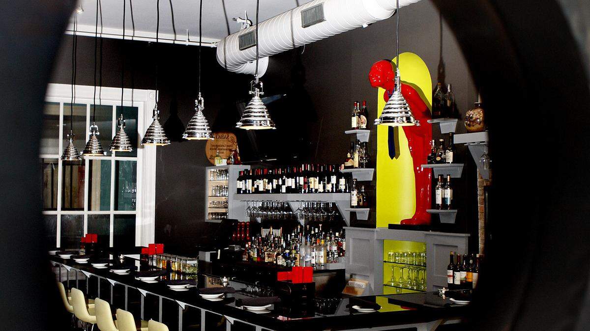 Detention Bar reflected in a mirror at Sabio in Dudley Square in Lexington, Ky., Monday, January 26, 2015. Photo by Matt Goins