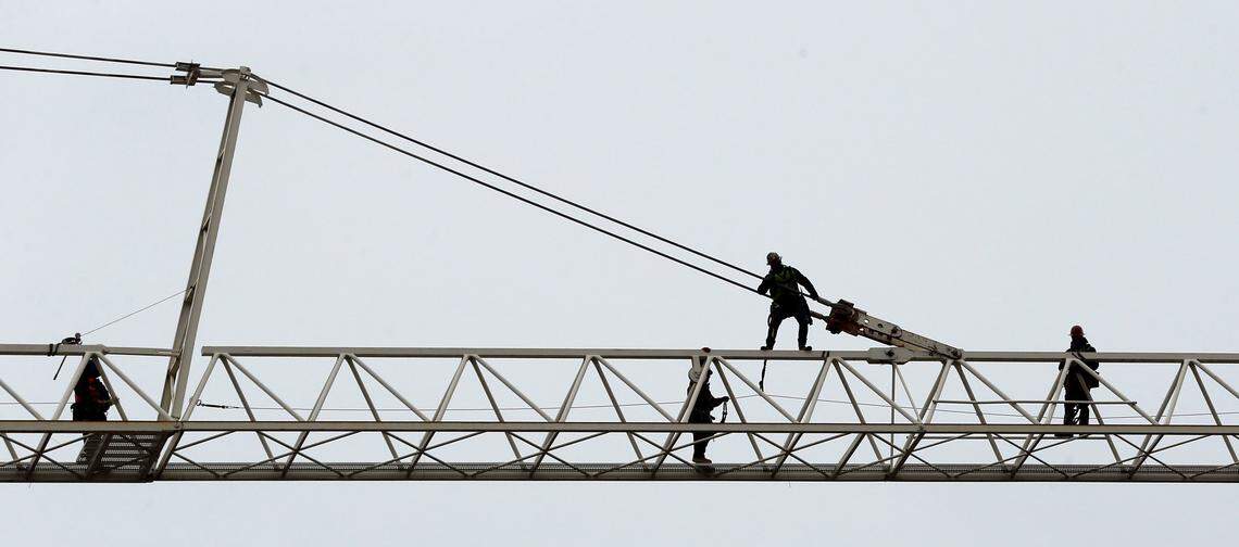 Crews worked disassembling a tower crane that has been on the site of the City Center development for four years Thursday, Jan. 17, 2019.