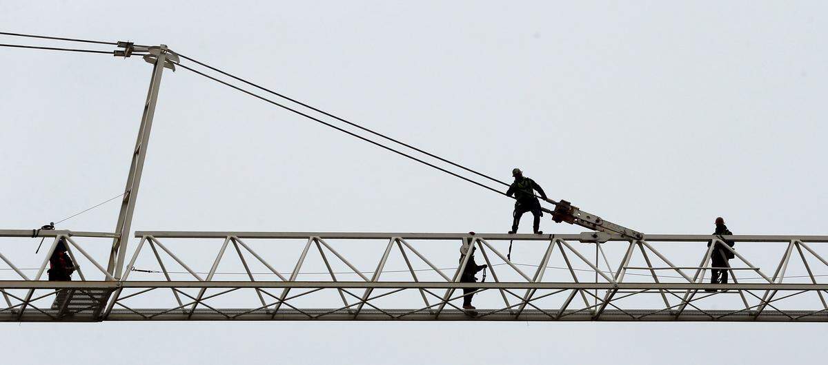 Crews worked disassembling a tower crane that has been on the site of the City Center development for four years Thursday, Jan. 17, 2019.
