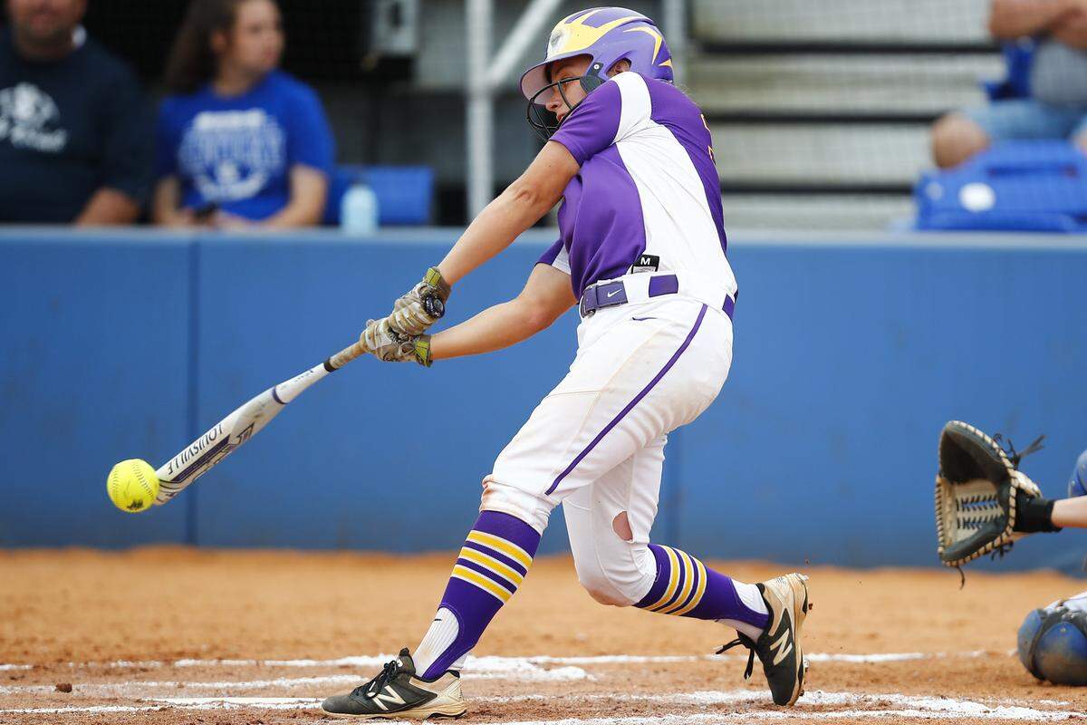 Male’s Megan Konermann (32) bats during the KHSAA State Softball Tournament championship against Warren East at John Cropp Stadium in Lexington, Ky., Saturday, June 15, 2019. Male beat Warren East 6-1. 