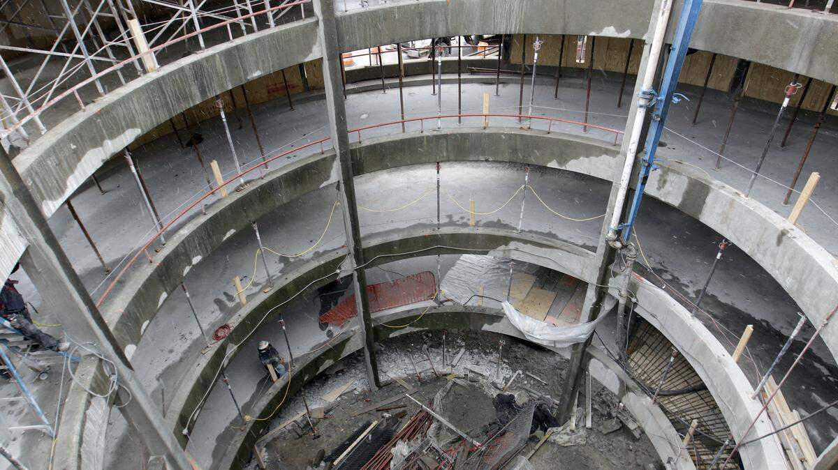 Concrete was poured at the helix ramp of the city's Annex parking garage next to the Police Station on East Main St. in Lexington, Ky., Friday, March 01, 2013. The garage has been closed for a complete renovation and is scheduled to reopen on May1. Photo by Charles Bertram | Staff





