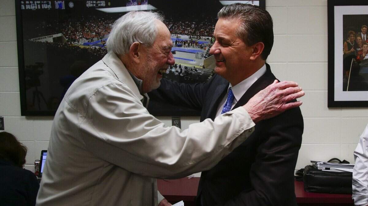 Kentucky head coach John Calipari received a surprise visit from C.M. Newton during a press conference after UK defeated Alabama in 2016 in Tuscaloosa, Ala.