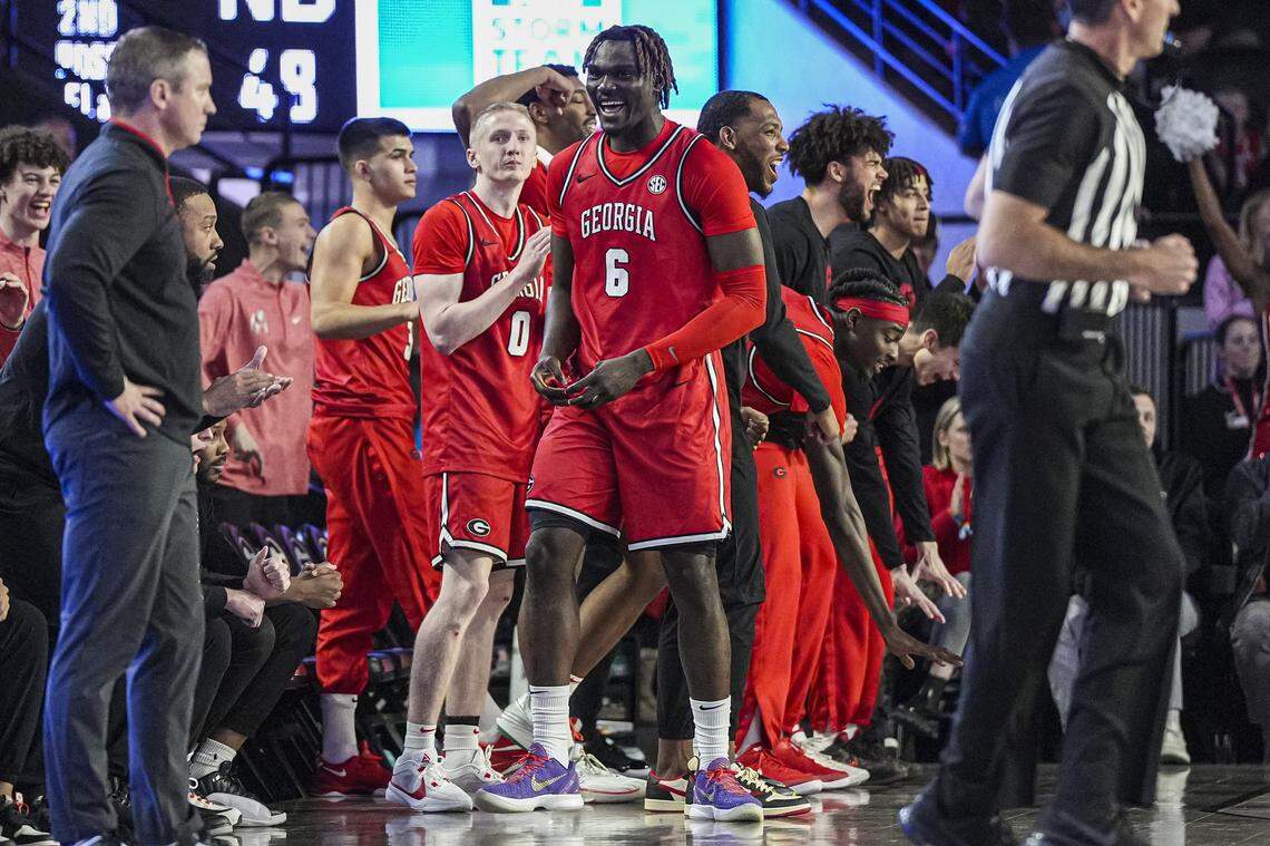 Dec 3, 2024; Athens, Georgia, USA; Georgia Bulldogs players including center Somto Cyril (6) react after defeating the Notre Dame Fighting Irish at Stegeman Coliseum. Mandatory Credit: Dale Zanine-Imagn Images