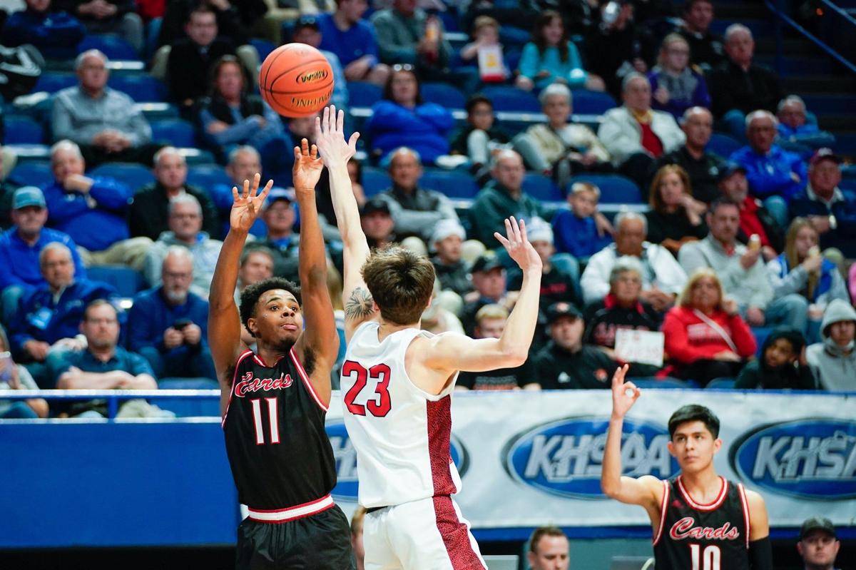 Clark County’s Jerone Morton (11) shoots over Perry County Central’s Tyler Day (23) during the Cardinals’ Sweet 16 win. Morton scored 22 points.