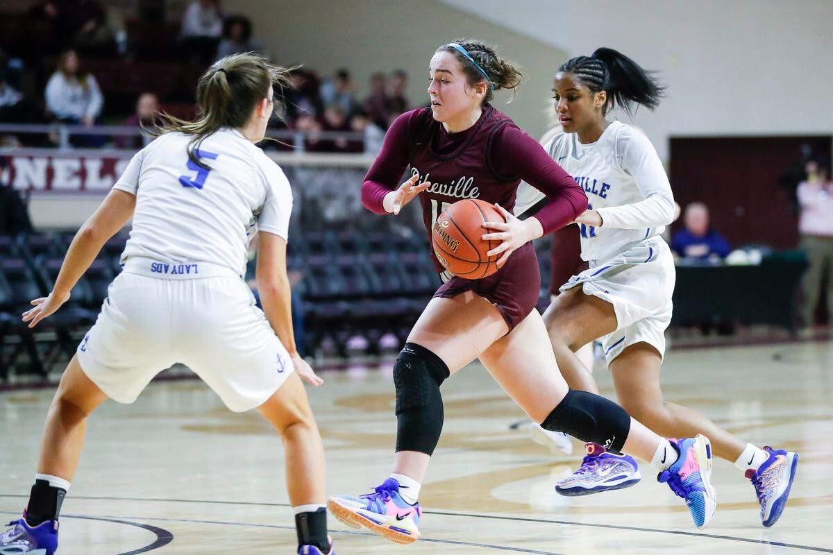 Pikeville’s Kyera Thornsbury, center, drives to the basket against Danville during the All “A” Classic in Richmond on Jan. 27, 2023.