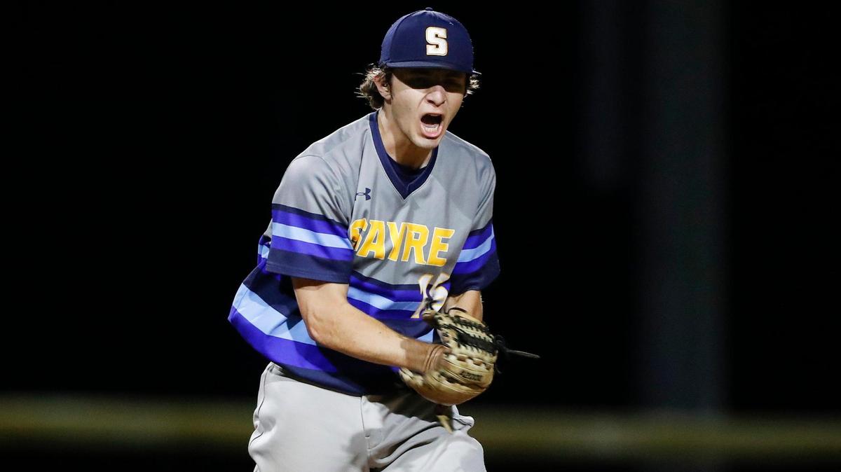 Sayre pitcher Raymond Saatman (15) celebrates after striking out the final Lafayette batter to win their 11th Region Tournament semifinal last season. The Spartans are ranked No. 4 in the state this preseason.