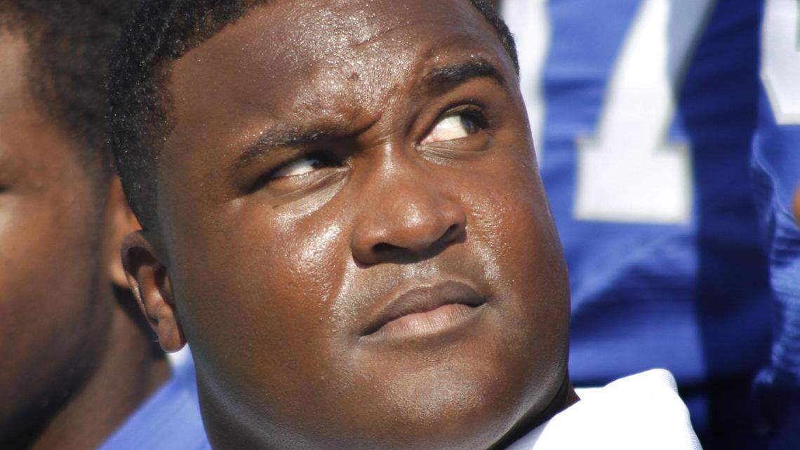 Tee Martin had been contacted by other schools before receiving a raise and contract extension from Kentucky. 