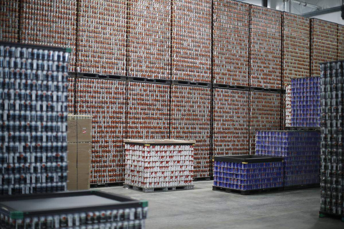 Thousands of empty beer cans waited to be filled at Country Boy Brewing in Georgetown on Friday.