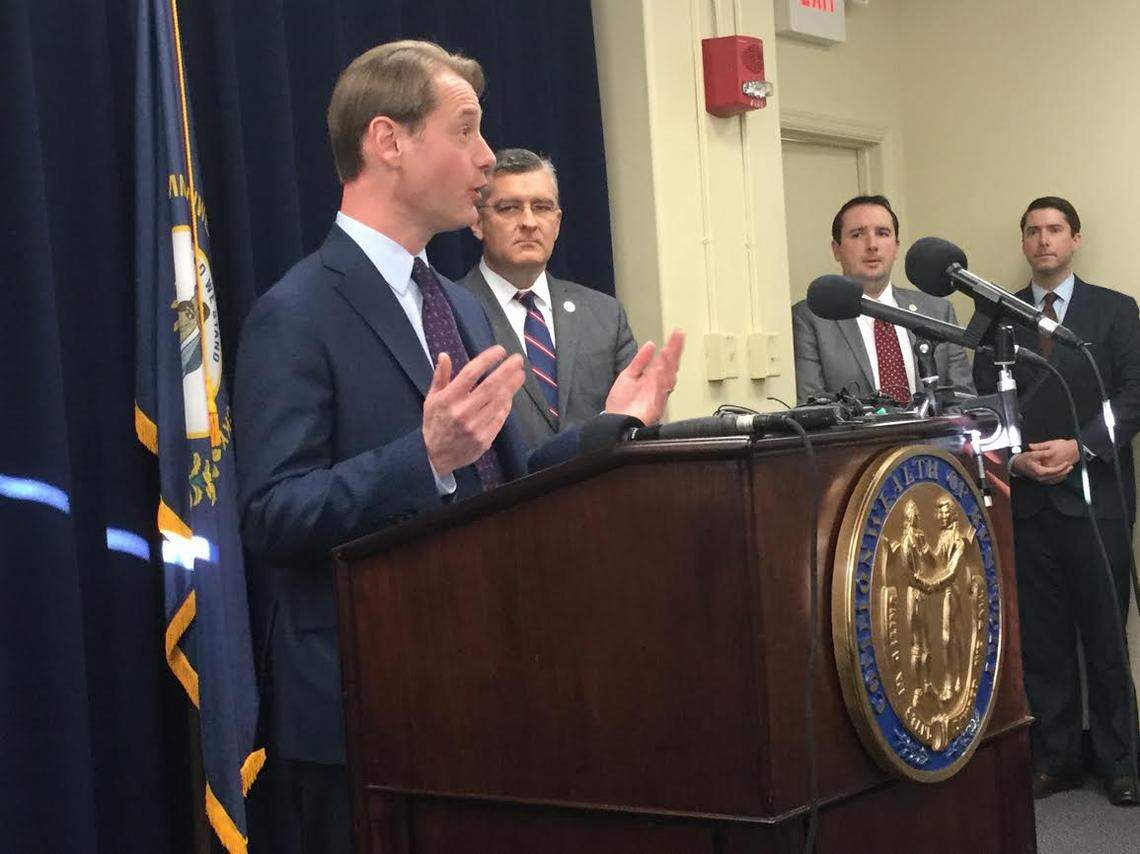 Kentucky Secretary of State Michael Adams, with state Sen. Robby Mills, R-Henderson, at his side, unveiled details Wednesday, Jan. 8, 2020, of Senate Bill 2, which would require official photo identification to vote in public elections.