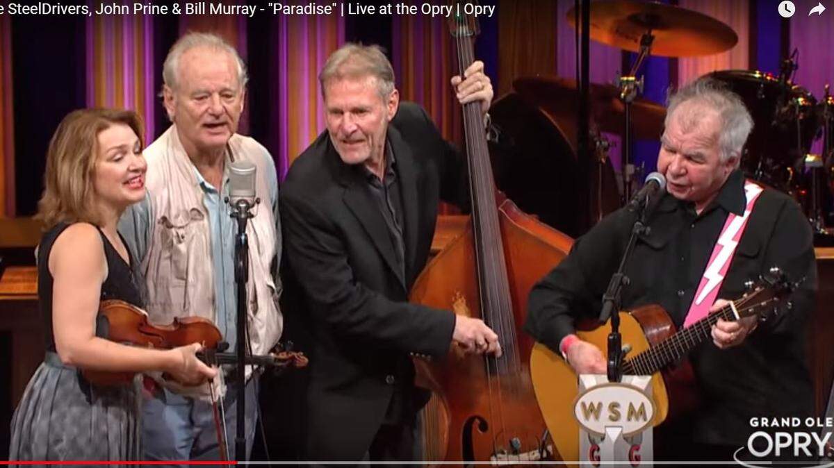 Bill Murray sang with John Prine and members of The SteelDrivers on the Grand Ole Opry Tuesday night.