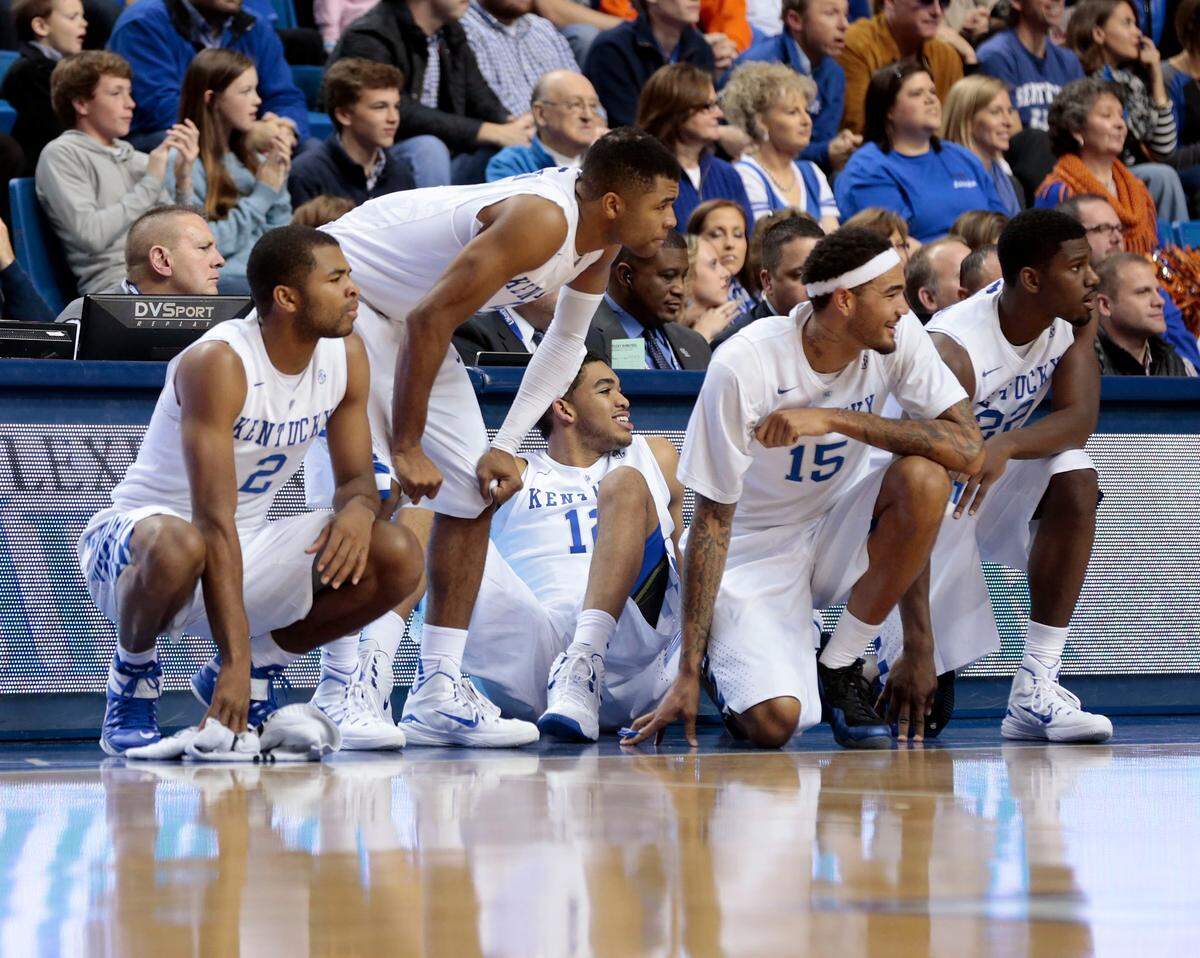 A 2014-15 team built around a platoon system finished 38-1, falling short of an NCAA title in the national semifinals. From left to right, Aaron Harrison, Andrew Harrison, Karl-Anthony Towns, Willie Cauley-Stein and Alex Poythress prepared to check into a game.