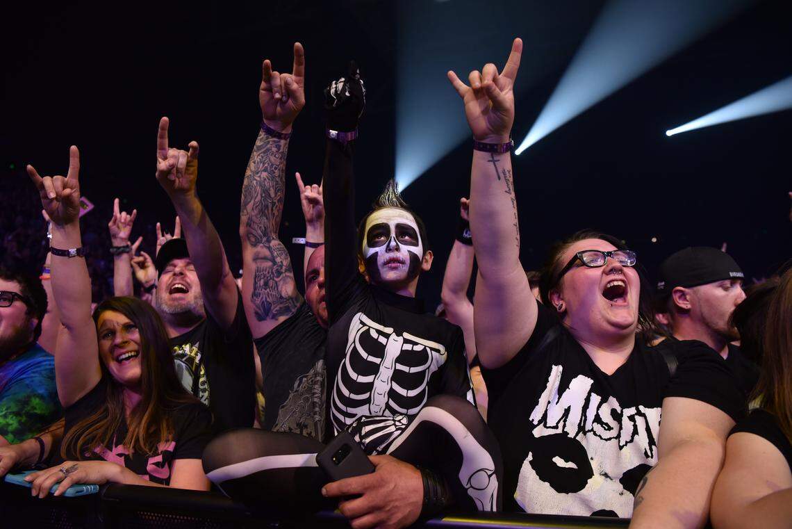 Fans cheer at the beginning of Five Finger Death Punch's set at Rupp Arena.