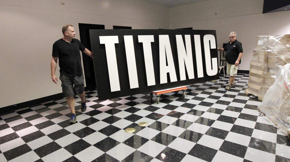 Project manager Jack Stiegler, left, and master carpenter Gordon Cameron set up last month for the Titanic exhibit that opens Friday at the Lexington Center Museum and Gallery.