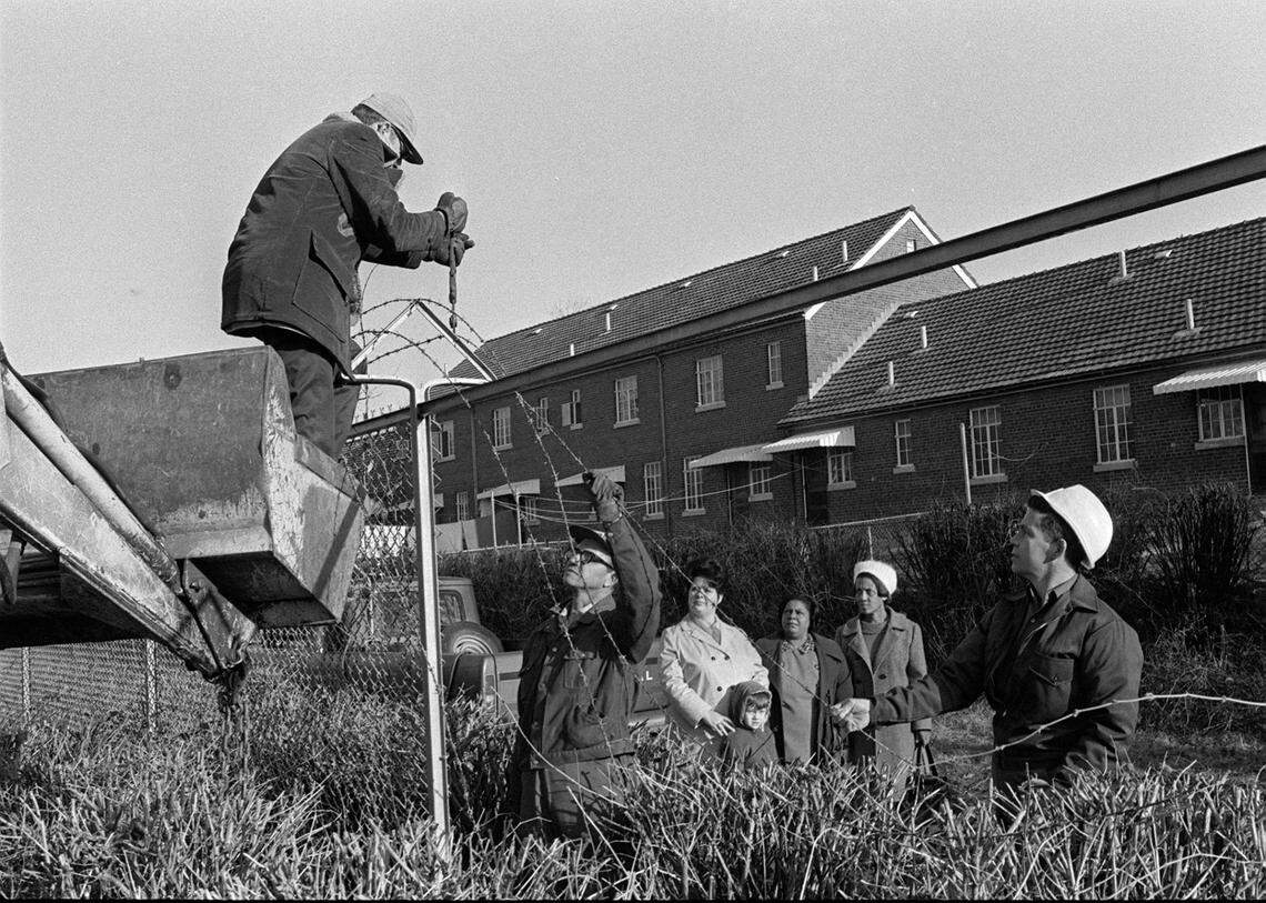An 8-foot fence that had separated Black and white residents since 1939 in the Bluegrass-Aspendale housing project was taken down on Jan. 30, 1974, after Jack Givens and his family moved to a house near Russell Cave Road.