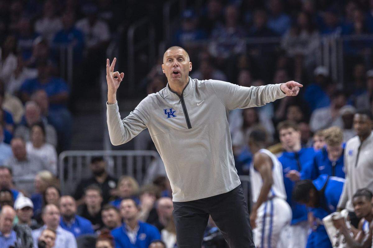 Kentucky head coach Mark Pope talks to his players during Tuesday’s game against Duke Blue in the Champions Classic at State Farm Arena in Atlanta.
