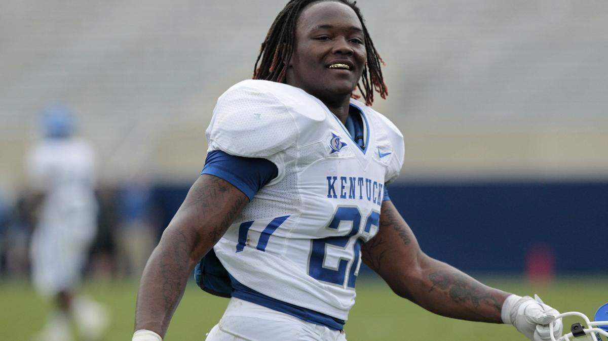 Danny Trevathan grinned at the sidelines during the UK football team's Blue-White Spring football game at Commonwealth Stadium in Lexington, Ky., on Saturday April 23, 2011.  Blue beat White  31-28. White team was made up of starters, Blue Team started the game with a 14 point lead.  Photo by Pablo Alcala | Staff
