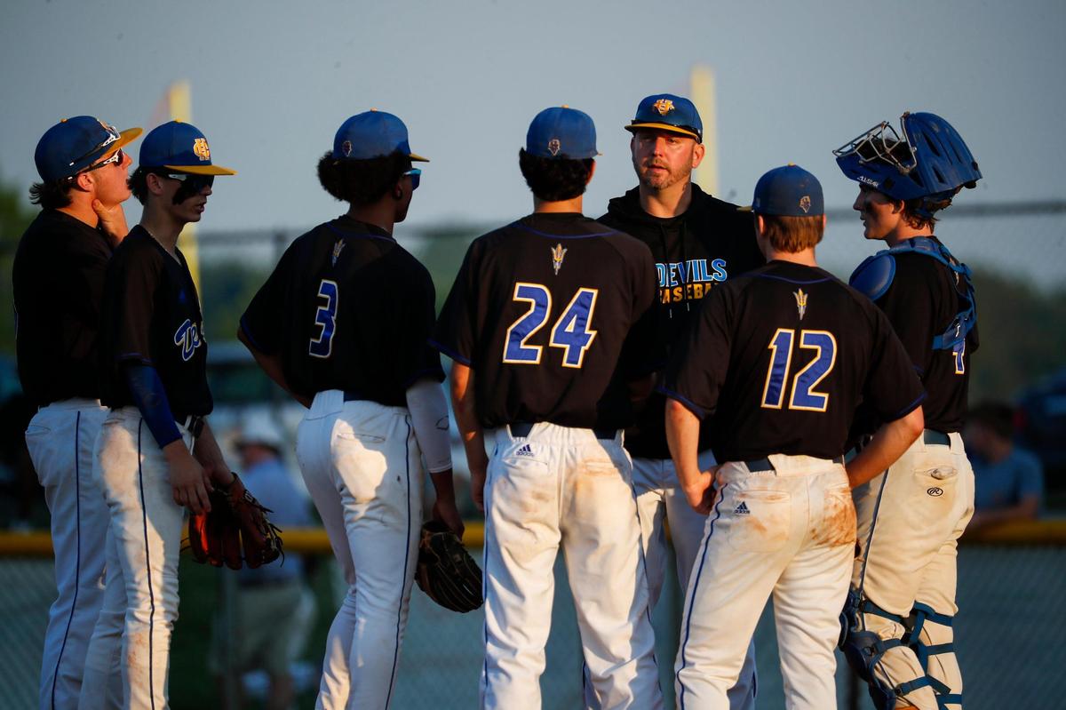 Henry Clay head coach Jordan Tarrence talks with his team during the 42nd District championship game last week. The Blue Devils defeated Lexington Christian in the opening round of the 11th Region Tournament on Monday.
