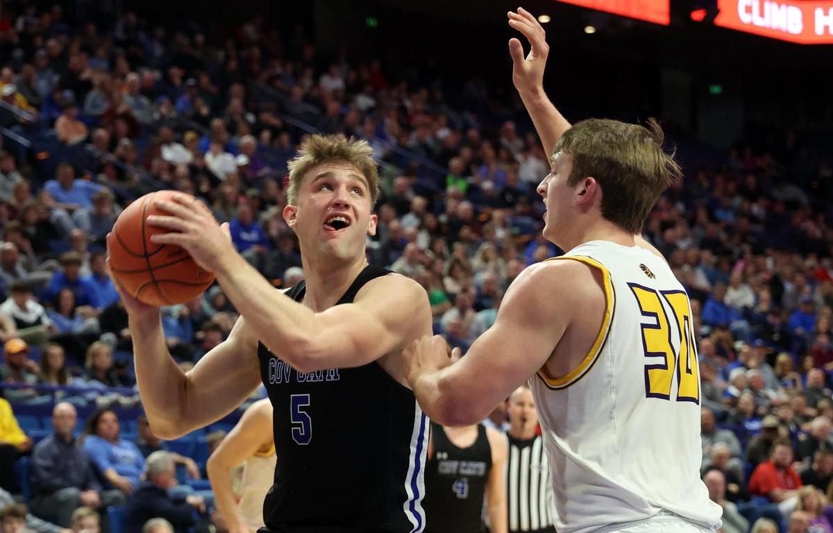Covington Catholic’s Mitchell Rylee (5) had 16 points and 11 rebounds to lead the Colonels past Lyon County, 59-57, in the quarterfinals of the UK HealthCare Boys’ Sweet 16.