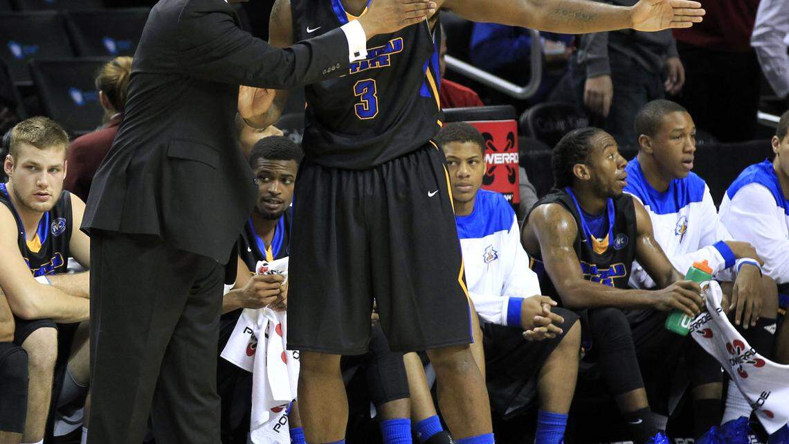 Morehead State Coach Sean Woods talked with Maurice Lewis-Briggs during the Eagles' season-opening win over LIU Brooklyn. Woods has drawn unwanted attention for his sideline demeanor.
  