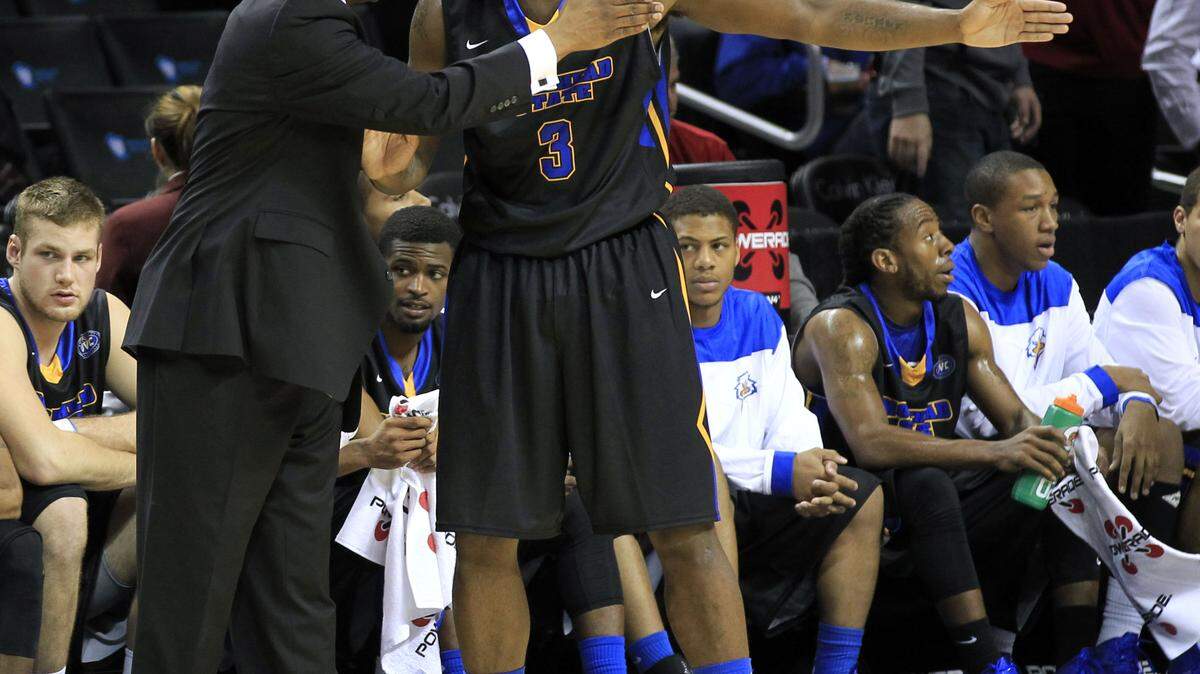 Morehead State Coach Sean Woods talked with Maurice Lewis-Briggs during the Eagles' season-opening win over LIU Brooklyn. Woods has drawn unwanted attention for his sideline demeanor.
  