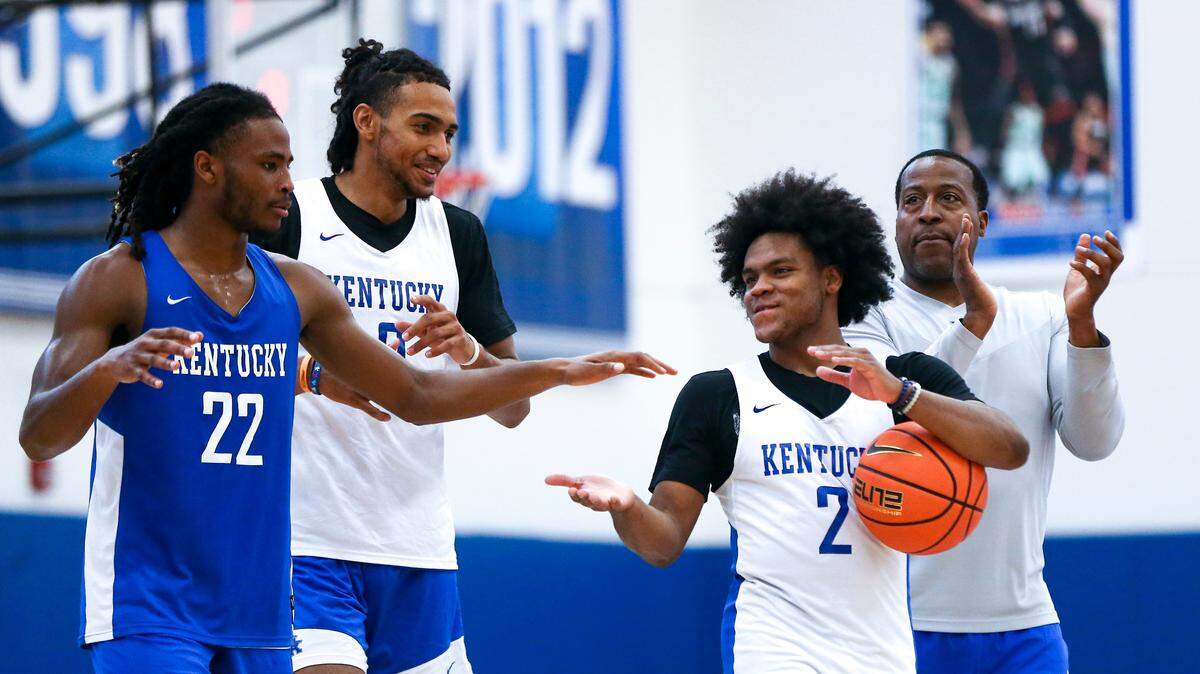 From left, Kentucky players Cason Wallace, Jacob Toppin and Sahvir Wheeler, as well as UK assistant coach Chin Coleman during one of the Wildcats’ early-season practices.