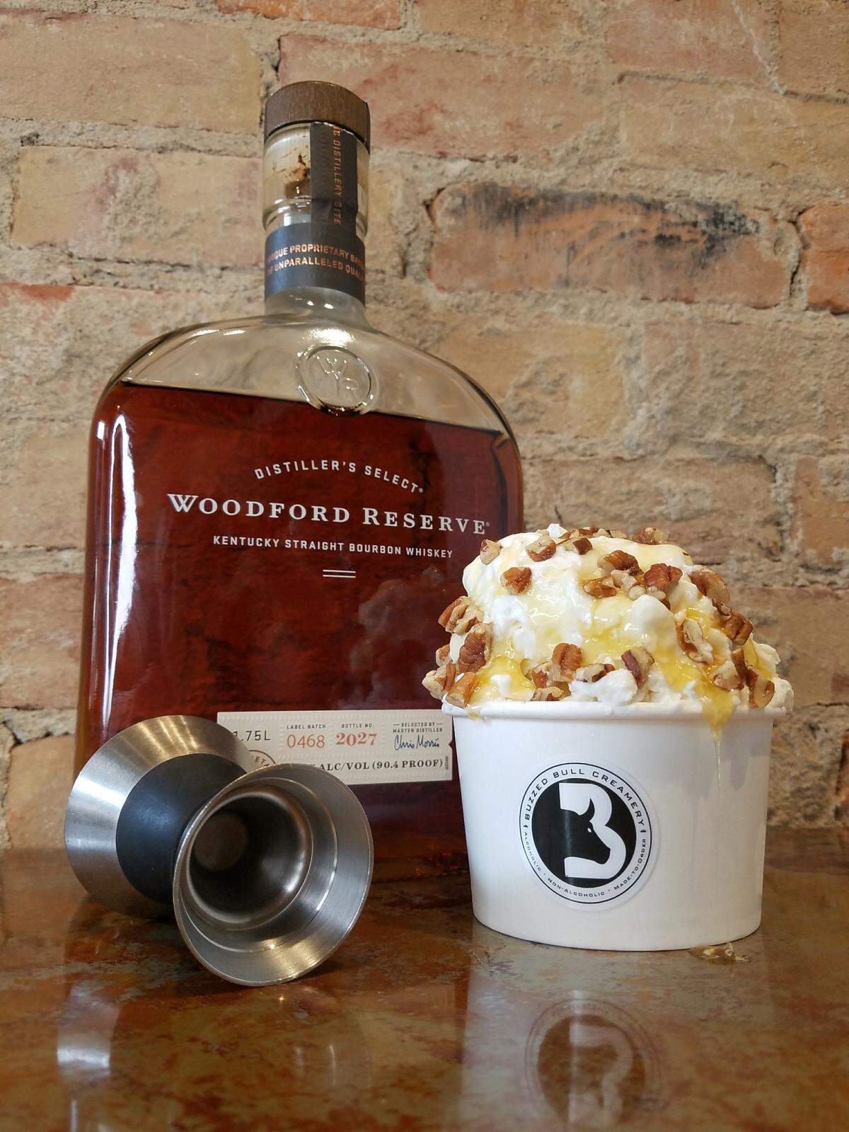 The Bourbon Honey Pecan ice cream at Buzzed Bull can be made with a real shot of your favorite premium bourbon, including Woodford Reserve.