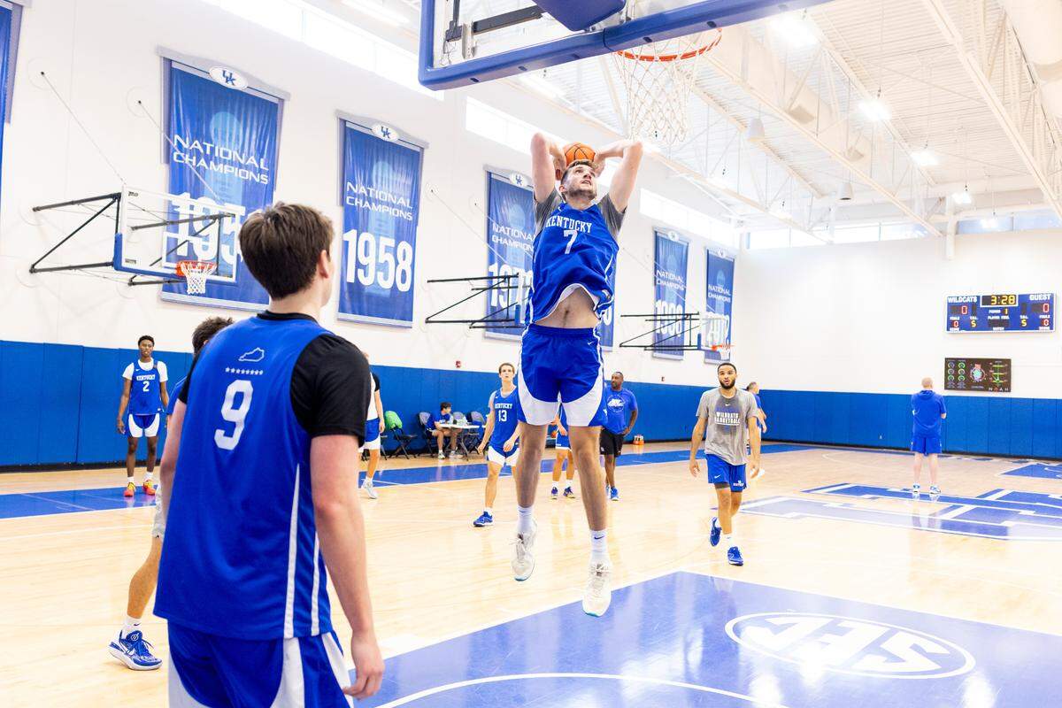 Andrew Carr goes in for a dunk during one of Kentucky’s early practices this summer. Carr transferred to UK after spending the past two seasons at Wake Forest. Before that, Carr spent two seasons at Delaware.