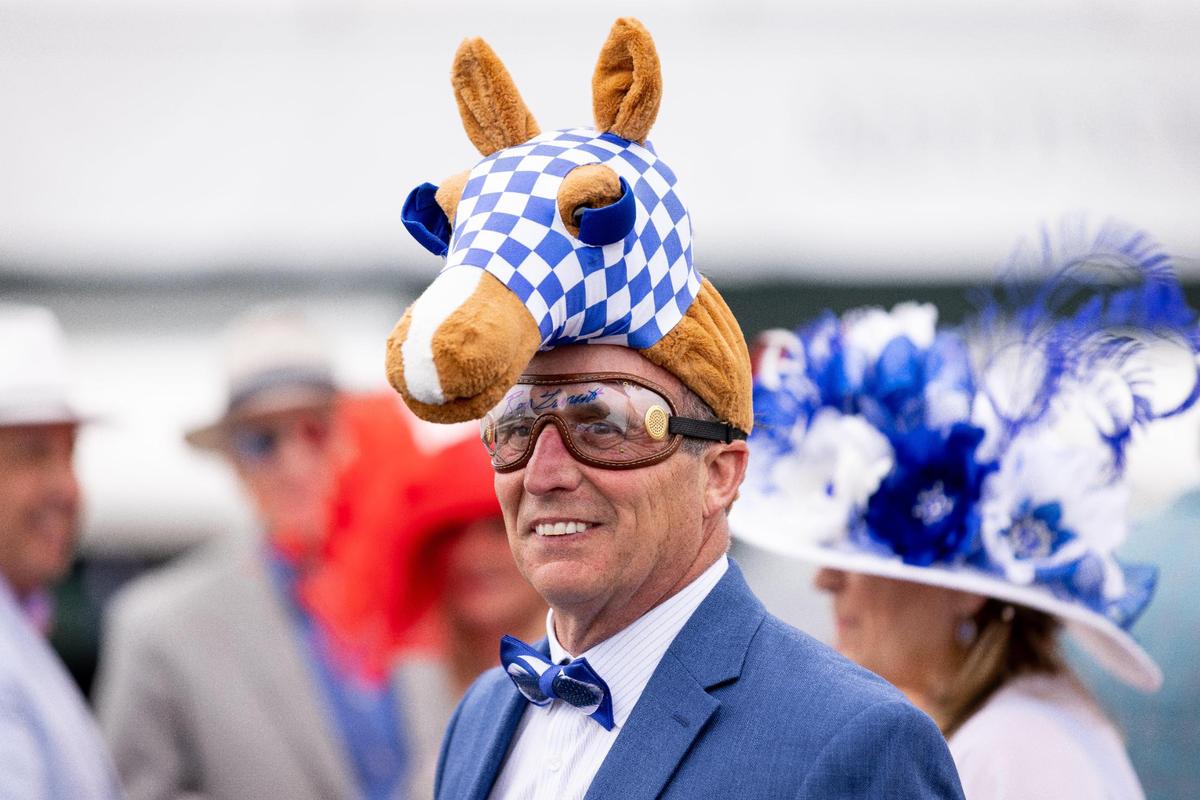 Joe Conforto, from California, wears a Secretariat outfit to celebrate the 50th anniversary of horse’s Triple Crown-winning campaign.