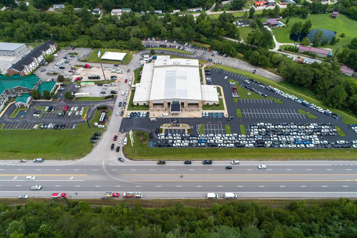 Family, friends and community members arrive for the funeral for Jacob Chaffins at the Mountain Arts Center in Prestonsburg, Ky., on Thursday, July 7, 2022. Chaffins, a Prestonsburg police officer, was killed in the line of duty last week.