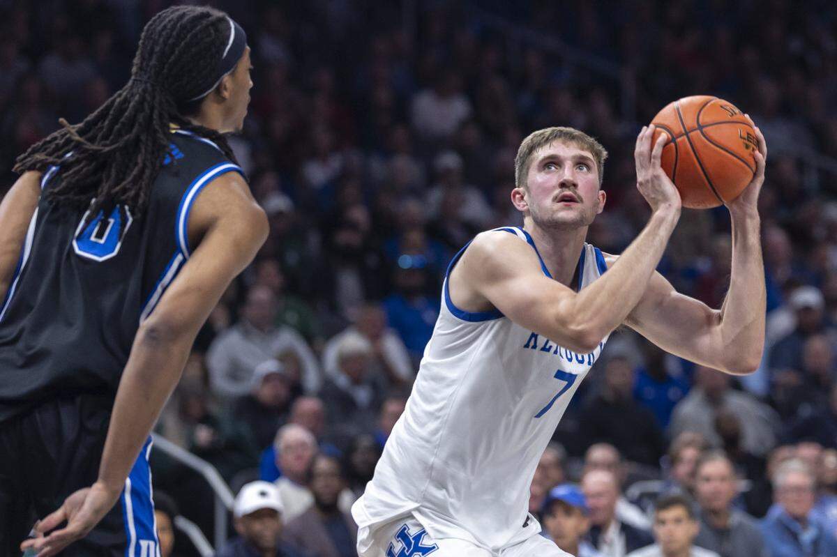 Kentucky forward Andrew Carr (7) was one of the heroes of UK’s 77-72 upset of then-No. 6 Duke in the Champions Classic. Carr, a transfer from Wake Forest, had 17 points, six rebounds and three assists vs. the Blue Devils.