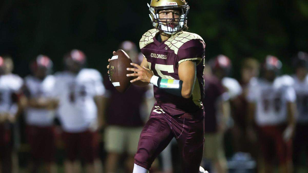 Bourbon County’s Clay Estes looks to pass during a 42-0 victory over Harrison County in the Mingua Beef Jerky Bowl at Bourbon County on Friday night.