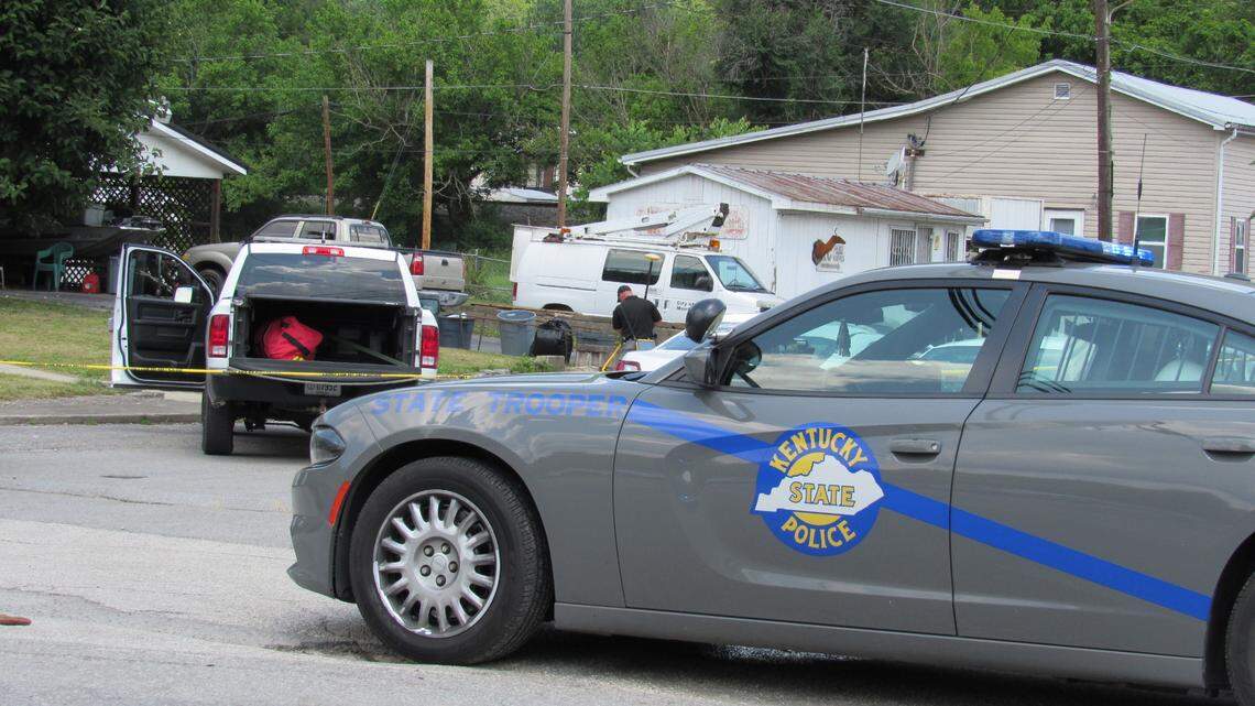 Kentucky State Police investigated on July 1, 2022 at the scene of a confrontation in Allen, Ky., that left three police officers and a police dog dead.