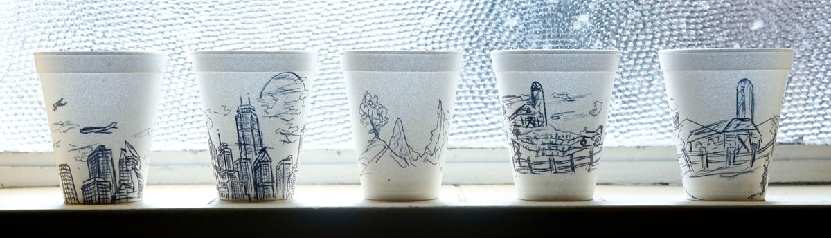 Some of the coffee cups sketched by homeless artist Jeff Maki at New Life Day Center.