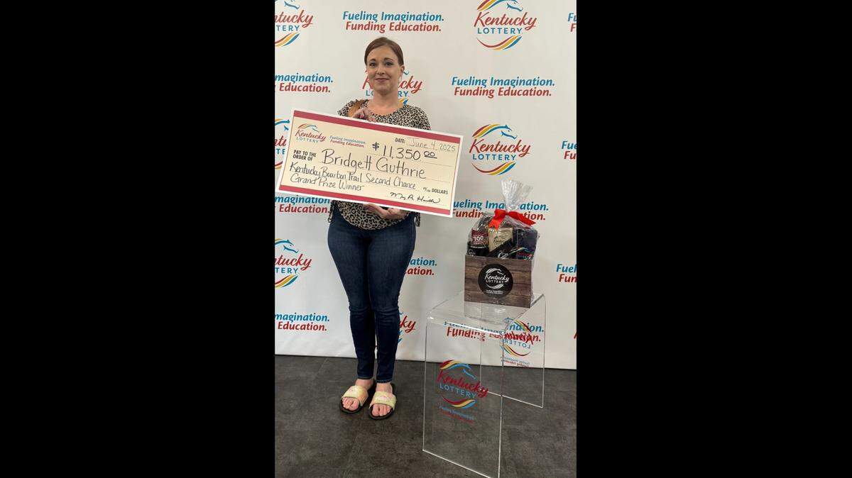 Bridgett Guthrie, of Mayfield, poses at Kentucky Lottery headquarters recently after winning a second-chance prize.