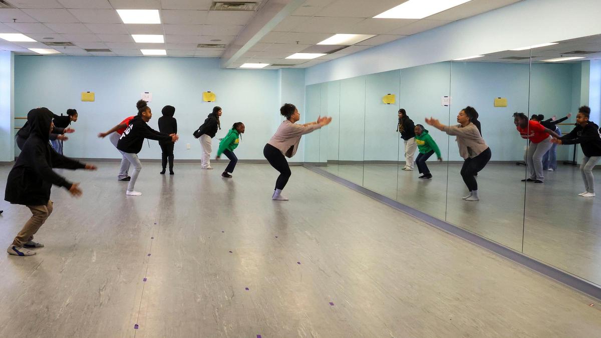 Teacher Hannah Reitz leads a dance class at Lexington Traditional Magnet School. The space was formerly used for in-school suspensions.