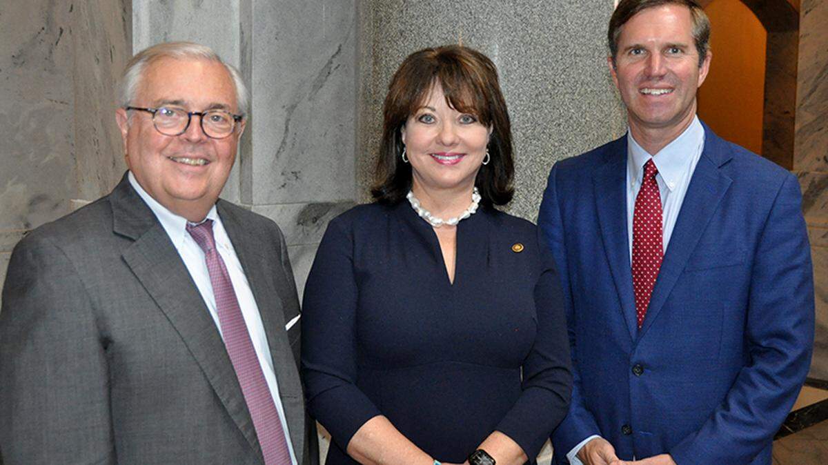 Chief Justice John D. Minton Jr., Justice Debra Hembree Lambert and Gov. Andy Beshear pose for a photo at a news conference Thursday to announce the new Kentucky Judicial Commission on Mental Health. Lambert will serve as the panel’s chairperson.
