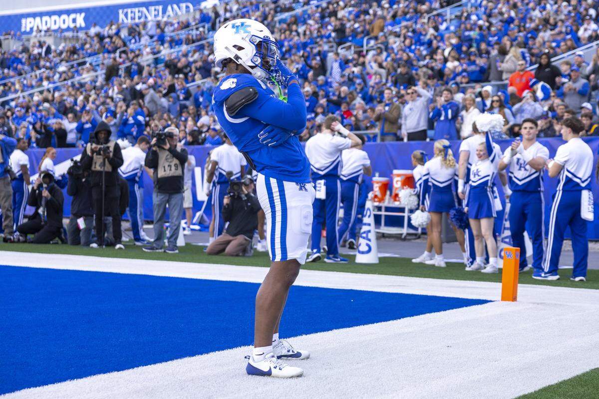 Kentucky running back Demie Sumo-Karngbaye reacts after scoring a touchdown against the Murray State at Kroger Field on Saturday.