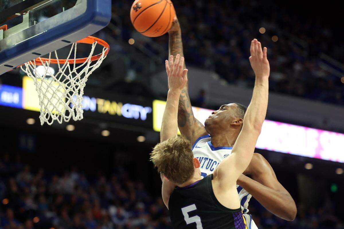 Kentucky’s Brandon Garrison, top, dunks on Minnesota State’s Harrison Braudis (5) during the second half at Rupp Arena on Tuesday.