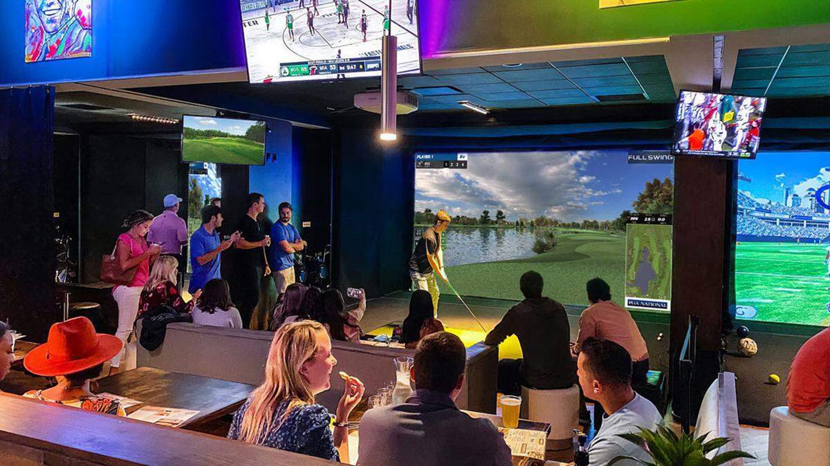 The new bar coming to Fayette Mall will have three Topgolf Swing Suites, which let up to eight players play simulated golf, baseball, hockey, soccer or zombie dodgeball.